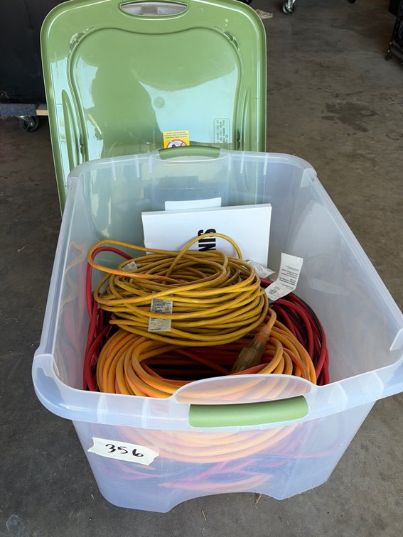 Large clear tote with Group of extension cords