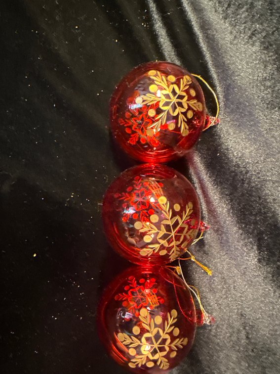 3 red and gold ornaments