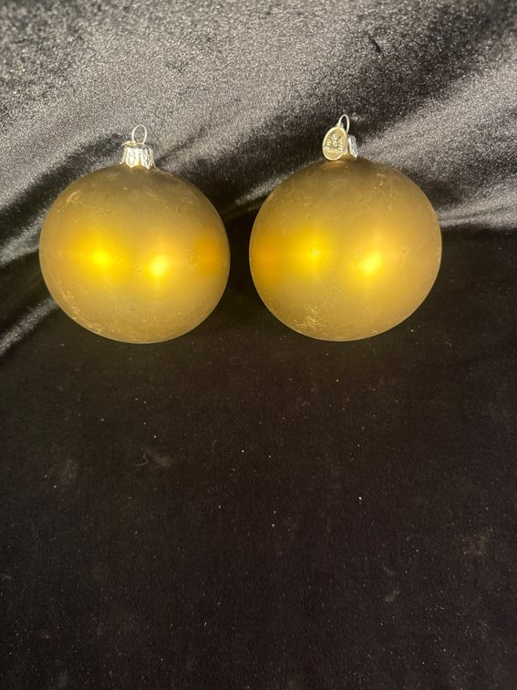 2 medium large gold ornaments