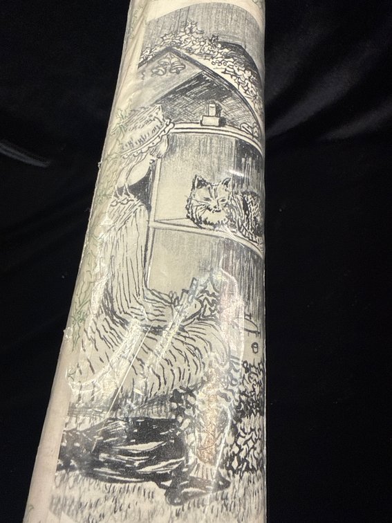 roll of vintage Christmas wrapping paper from "The Holly Bell Christmas Series" designed by artist Laura Hart Bell