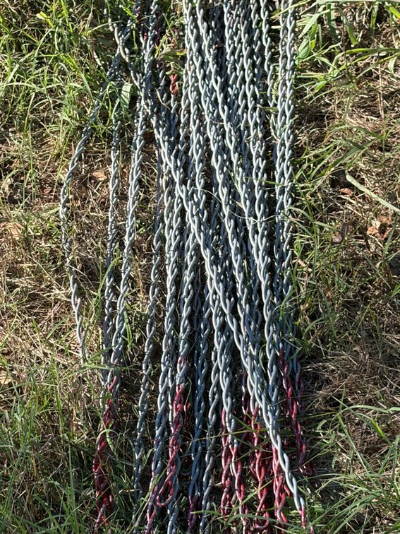 Barbed wire spacers