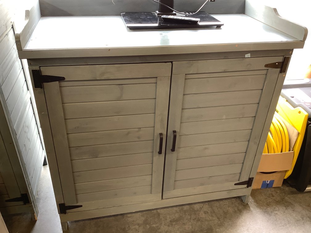 Two door wooden cabinet with metal top 39 x 19 x 37