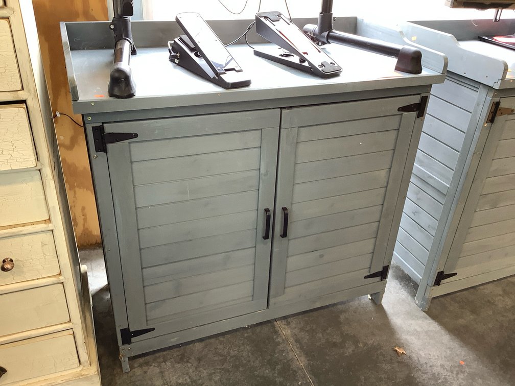 Two door wooden cabinet with metal top 39 x 19 x 37