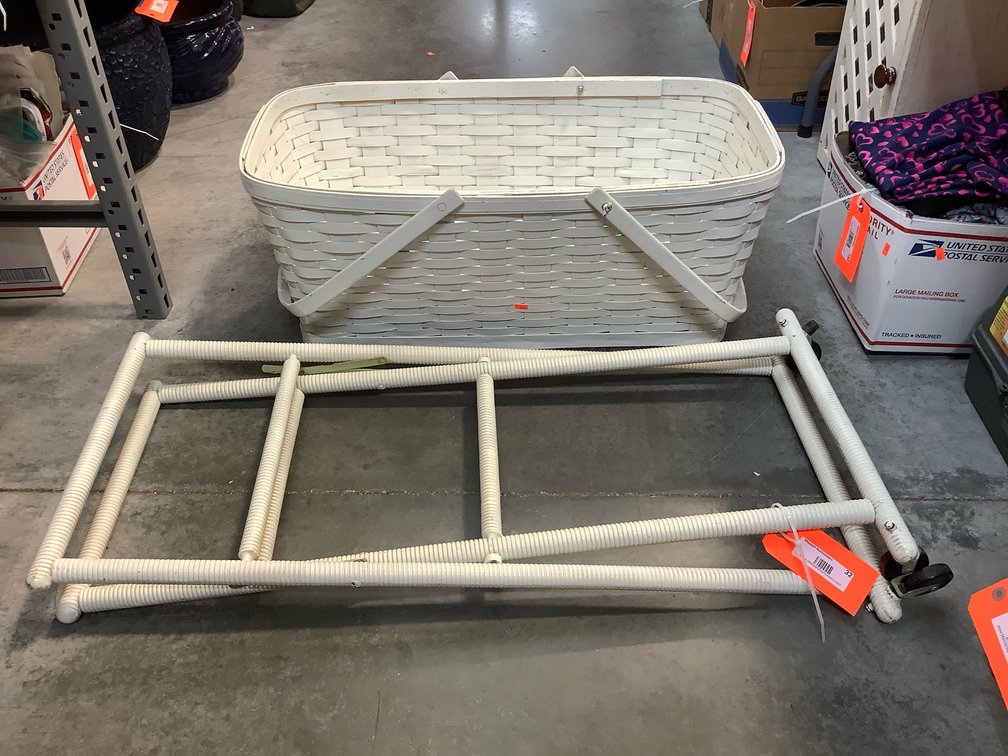 Bassinet with folding base