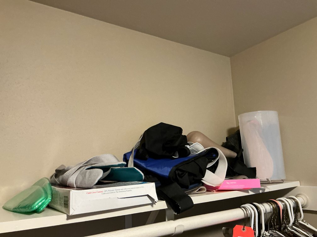 Bags, shoe soles & assorted on shelf-Master bedroom closet