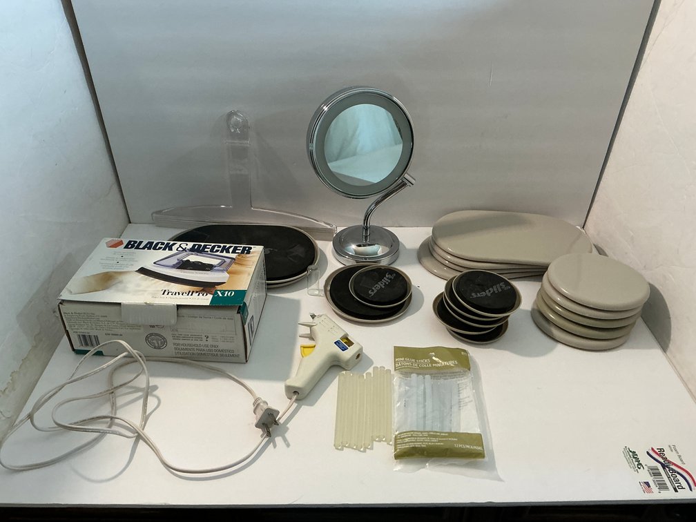Furniture moving pads, magnified mirror, glue gun & assorted -Master bedroom