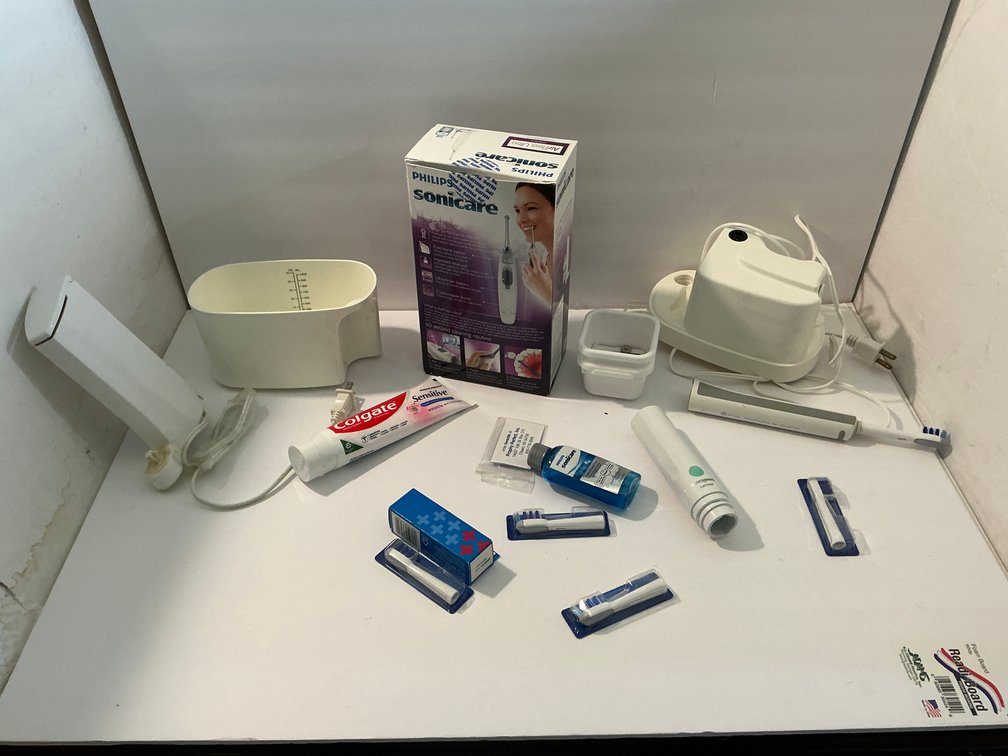 Sonicare air floss & assorted -Master bedroom
