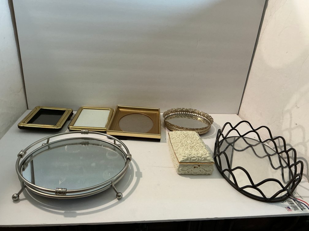 Picture frames & mirrored trays -Master bedroom
