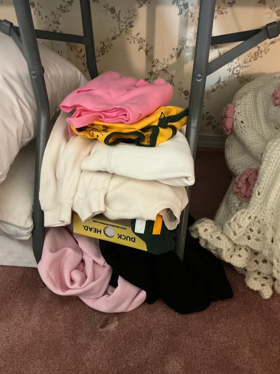 Assorted clothing -Master bedroom