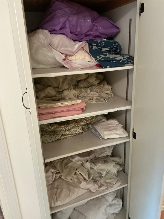 Assorted sheets-Hallway closet