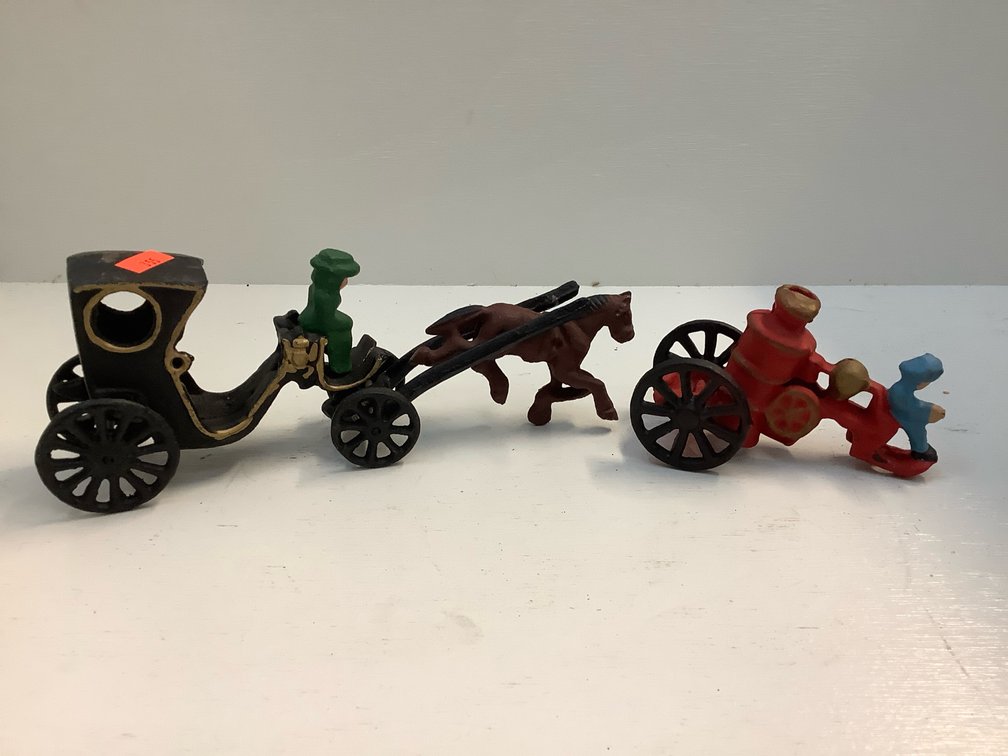Two cast-iron toys