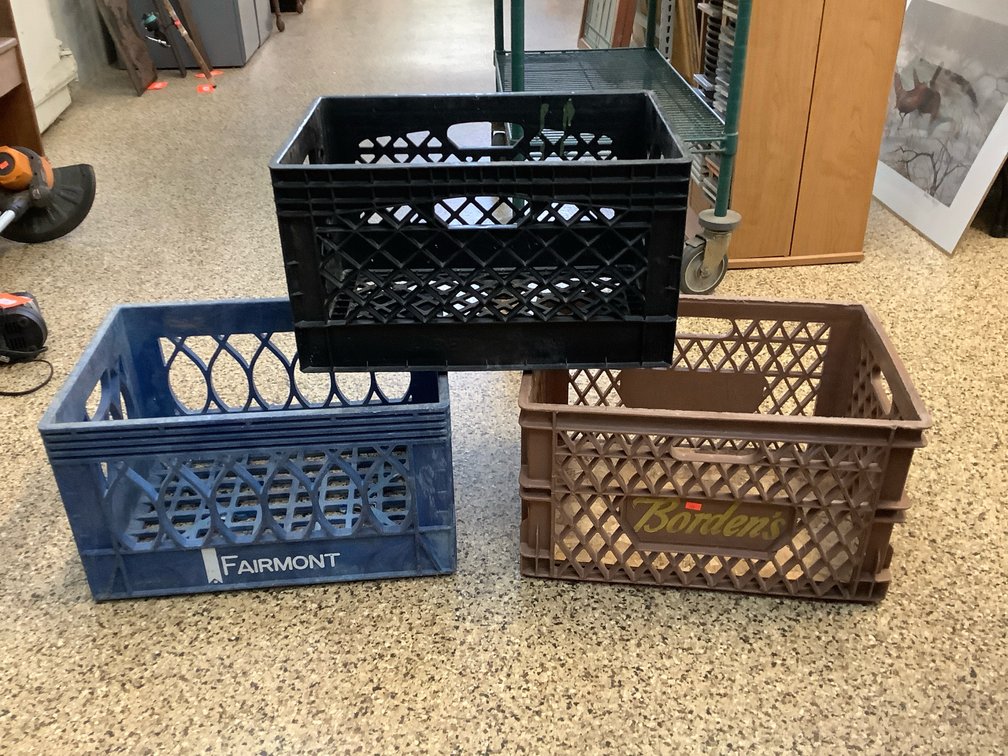 Three milk crates