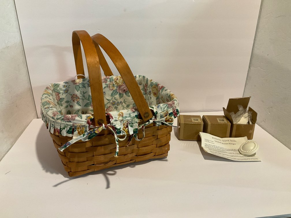 Double handle Longaberger basket and Pottery Barn hangers-Basement