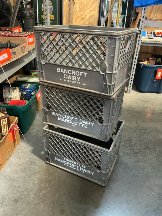 3 plastic dairy crates