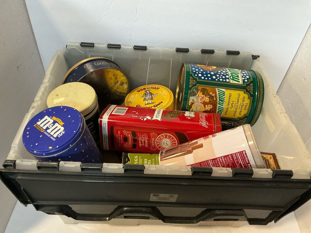 Covered tote of assorted tins