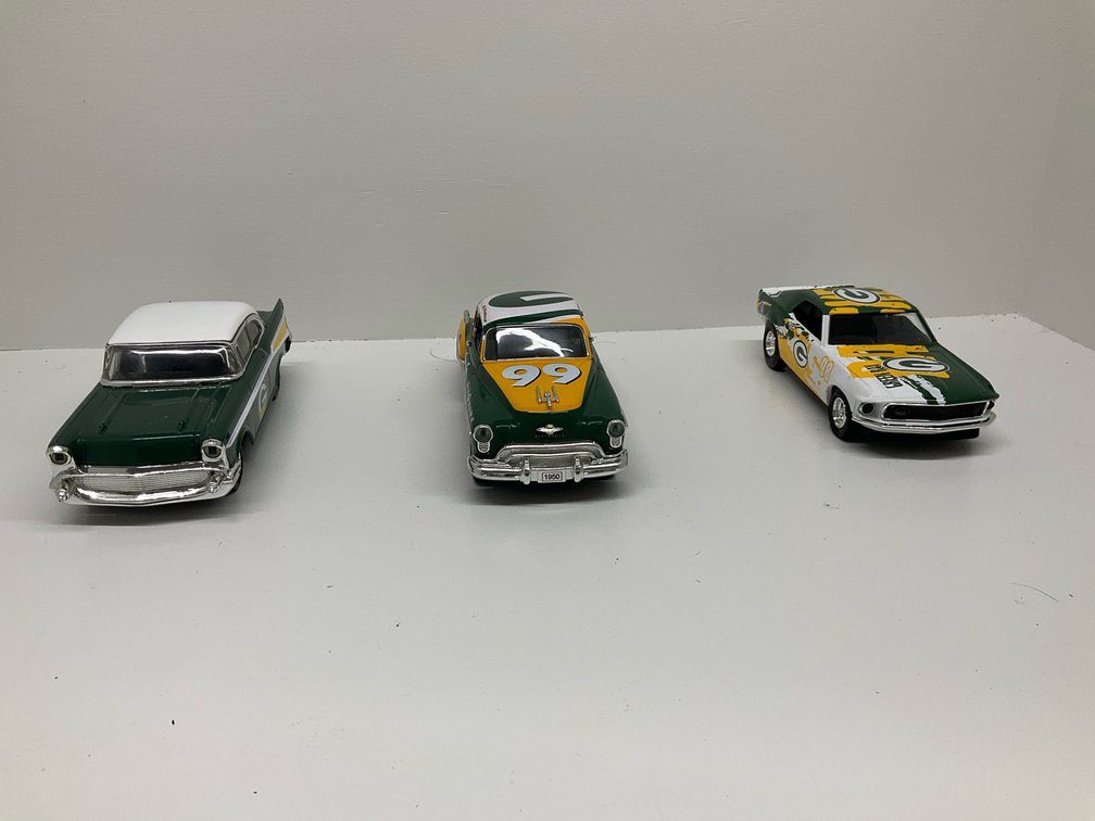 3 die cast toy Packer cars