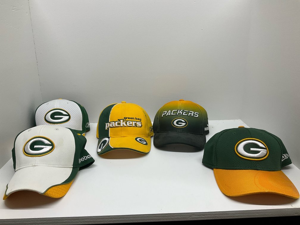 Grouping of new & like new Packer caps