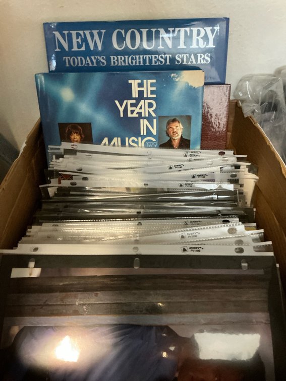 Large box of Autographed pictures, book
