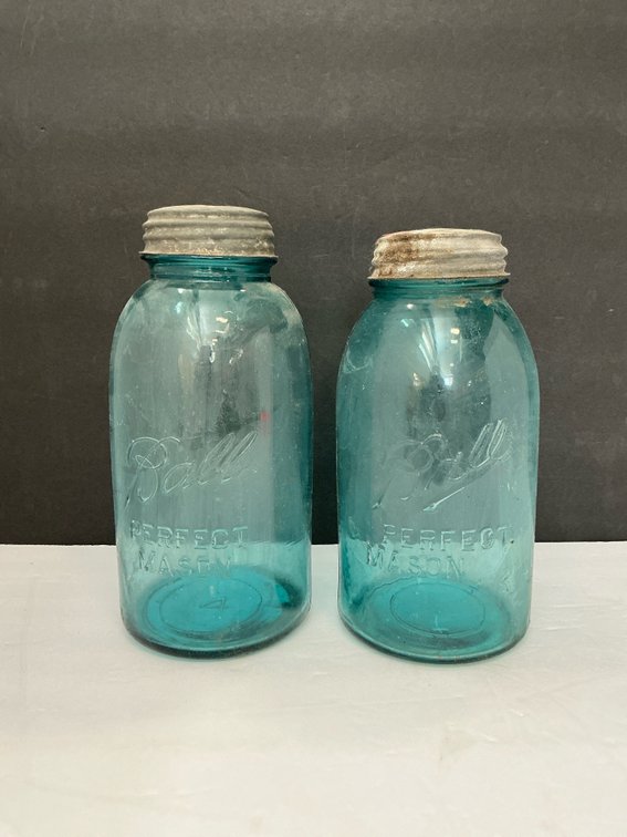 Two blue Ball Mason jars 10 inches tall