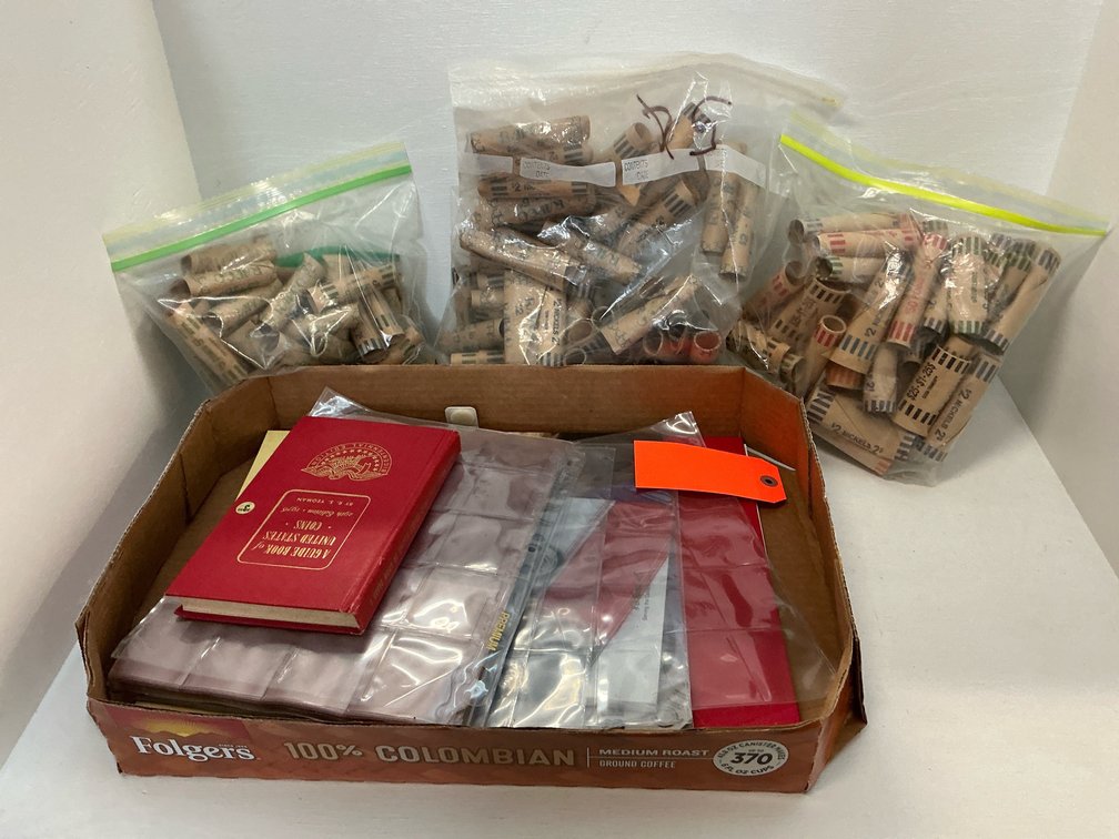 Coin collecting supplies with 1976 Red Book