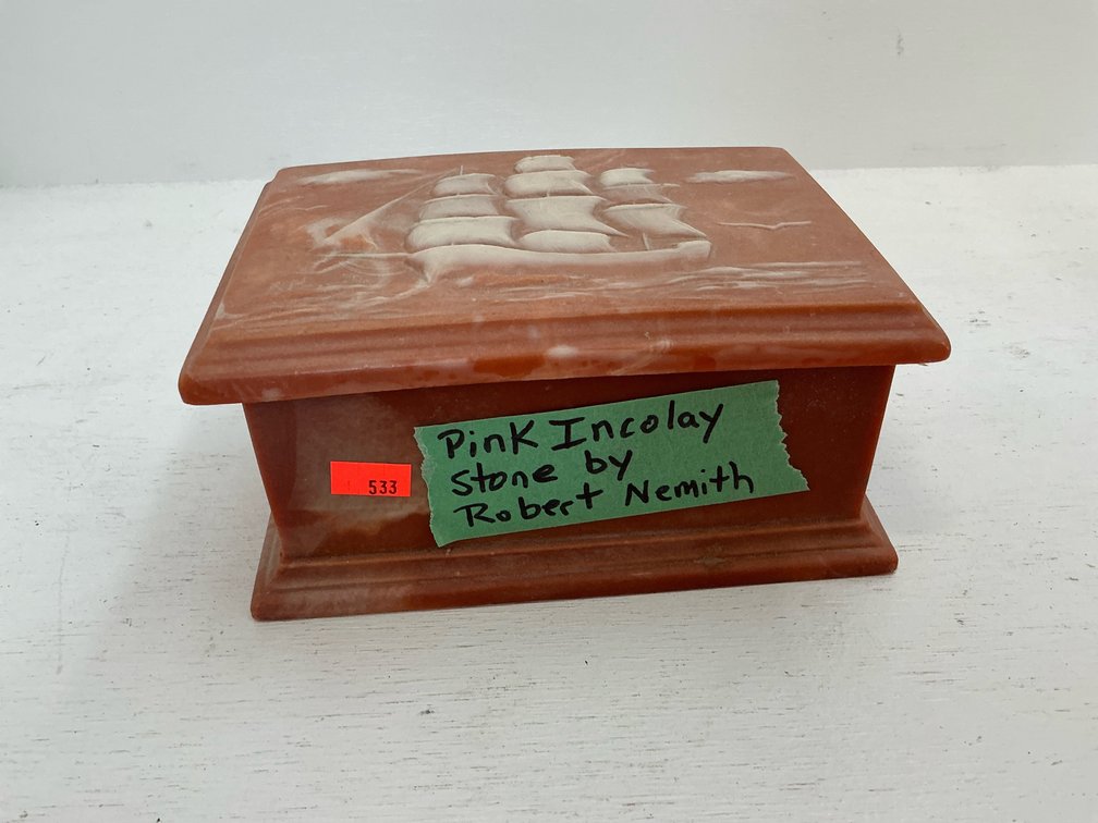 Pink carved trinket box with sailing ship motif