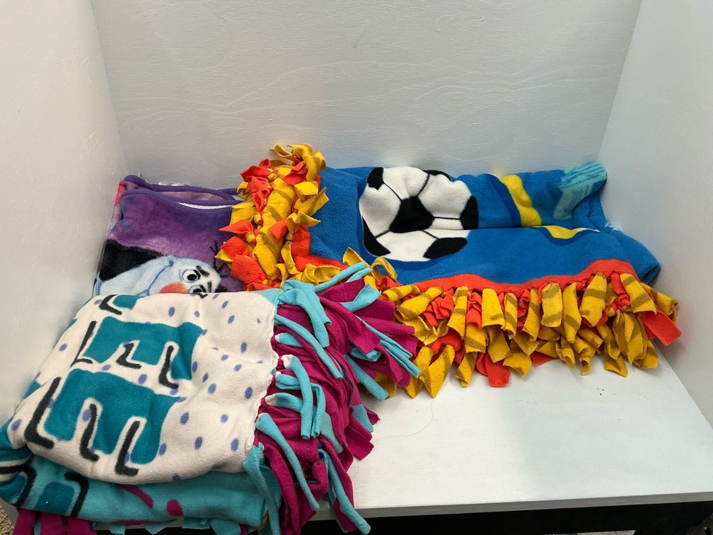 Assorted fleece blankets
