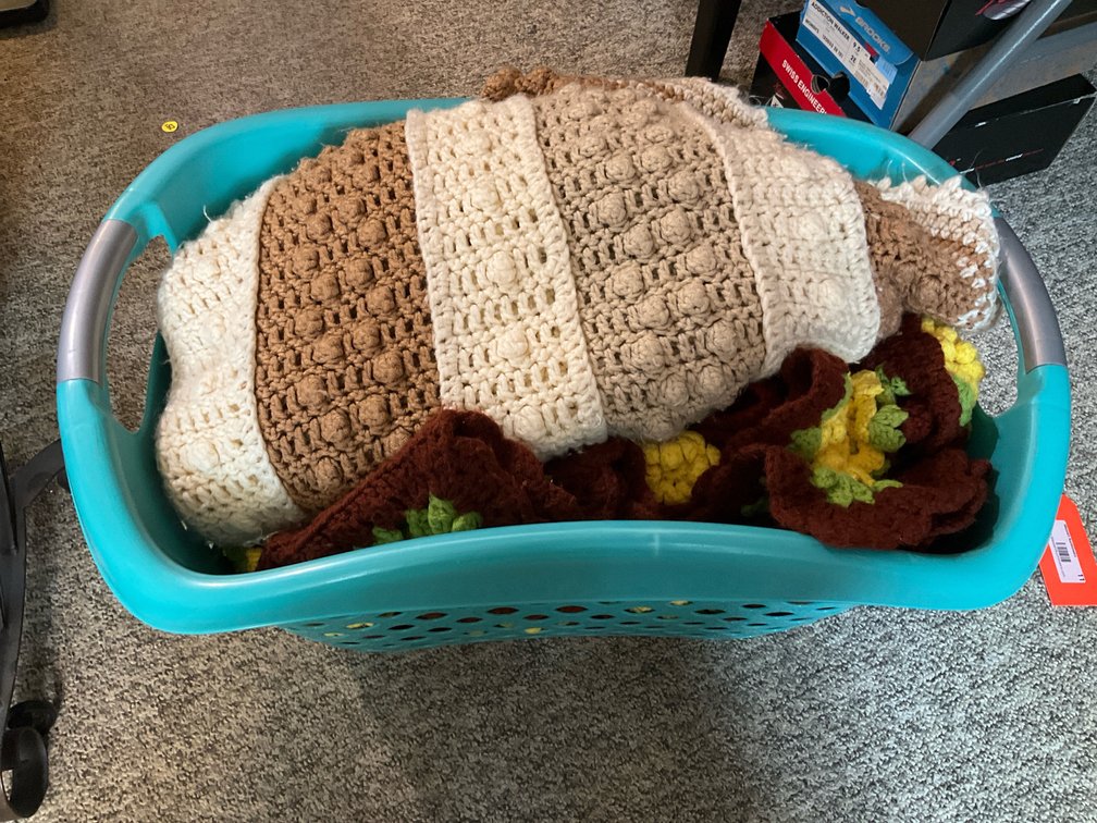 Assorted Crocheted Afghans & Blankets in basket