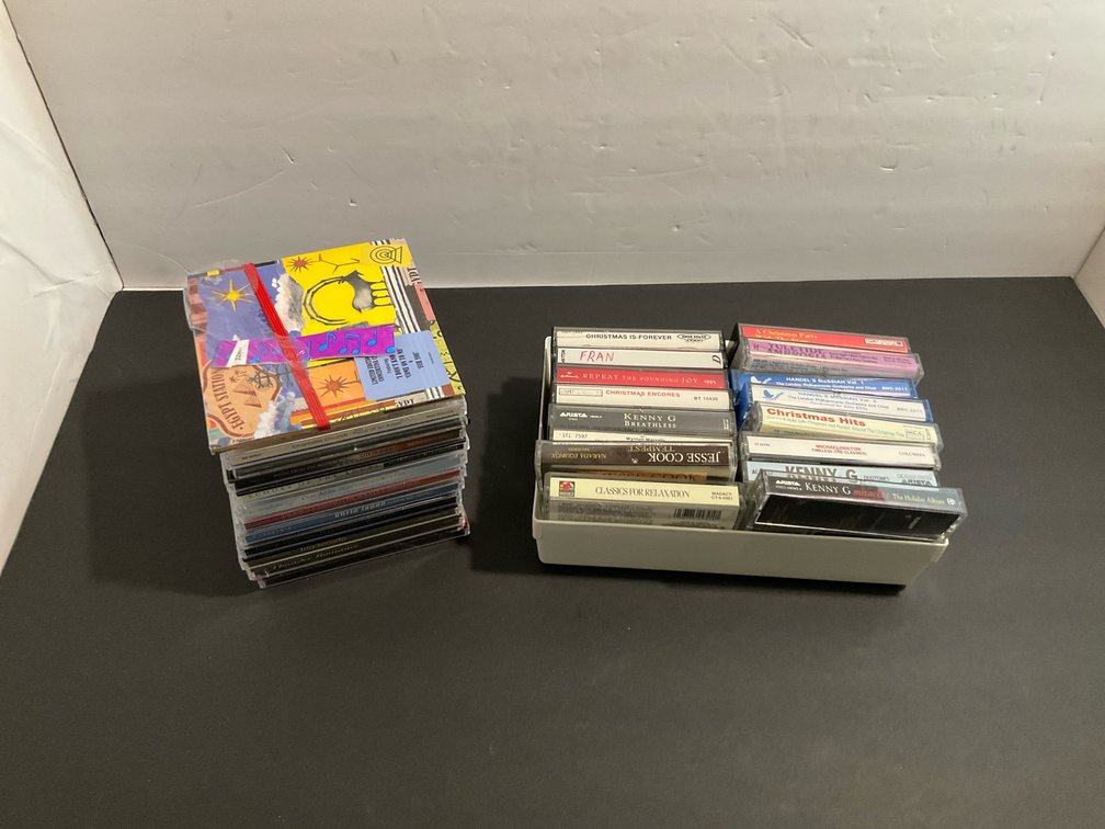 audio CDs & cassettes with storage tray