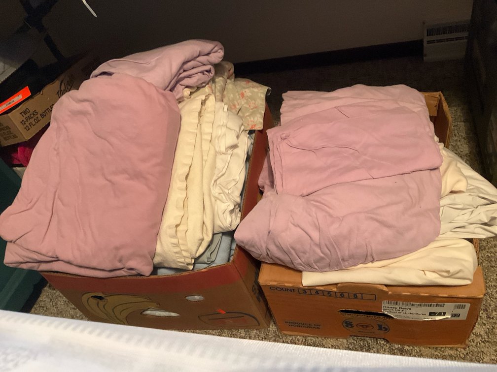 2 boxes of assorted linens & bedding
