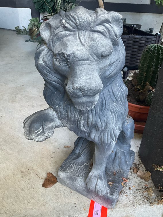 Cast stone crouching lion garden statue with raised paw 24” tall-Outside