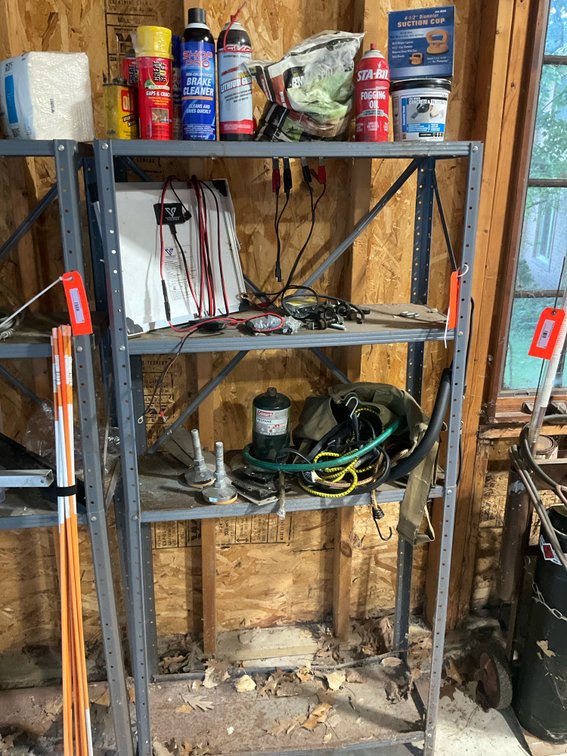 4-tier metal shelving unit with contents 30” x 12” x 61” -Garage
