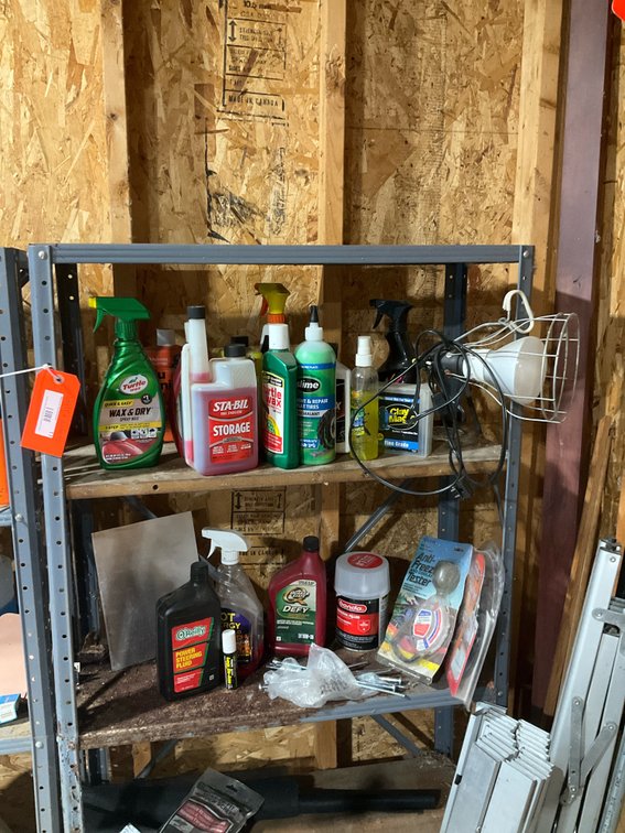 -Metal shelving unit with automotive fluids & supplies 30” x 12” x 61”