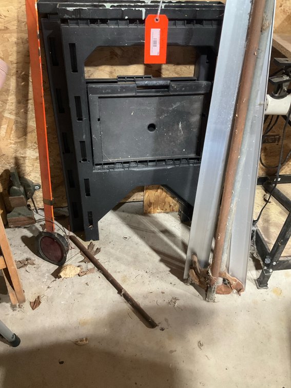 Pair of black plastic folding sawhorses