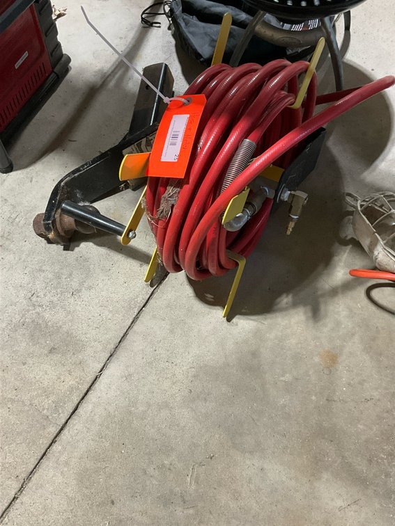 Air hose on reel & trailer hitch with ball