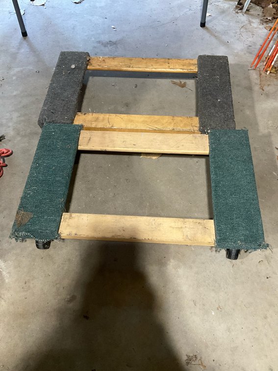Pair of wooden carpeted moving dollies