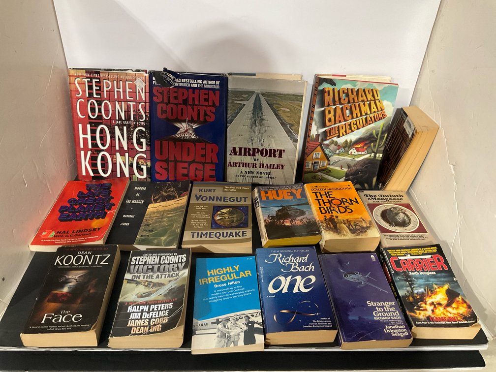 Grouping of hardcover & paperback books