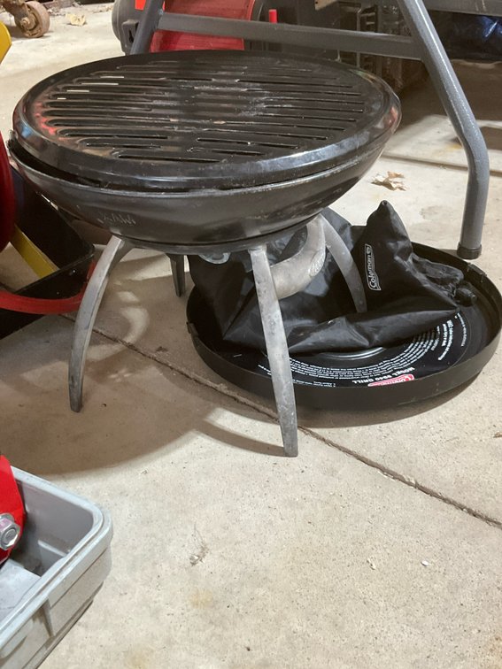 Coleman round portable grill with storage bag