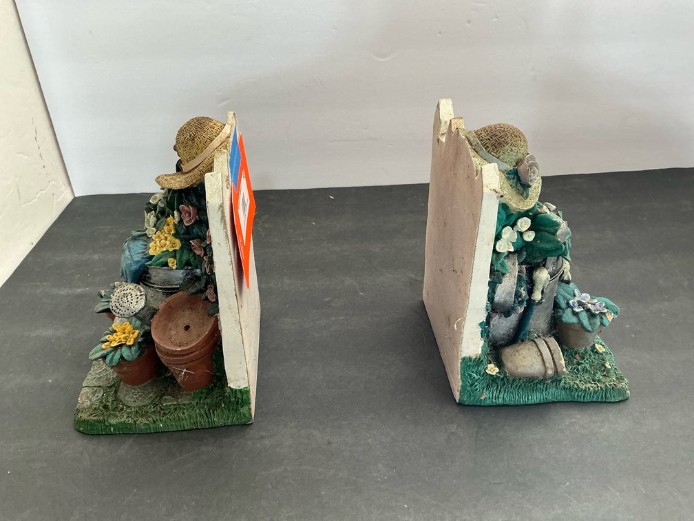 Pair of garden-themed resin bookends