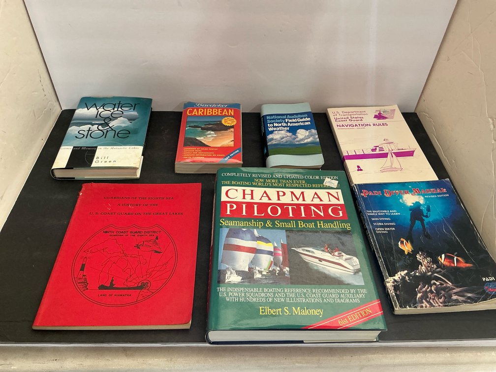 Grouping of maritime, navigation & reference books