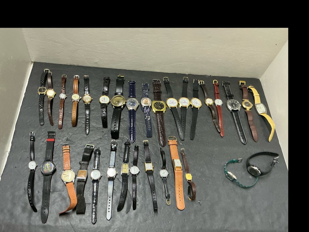 Grouping of wristwatches & extra straps
