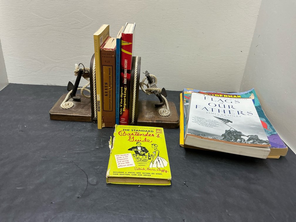 Pair of nautical anchor wooden bookends with books