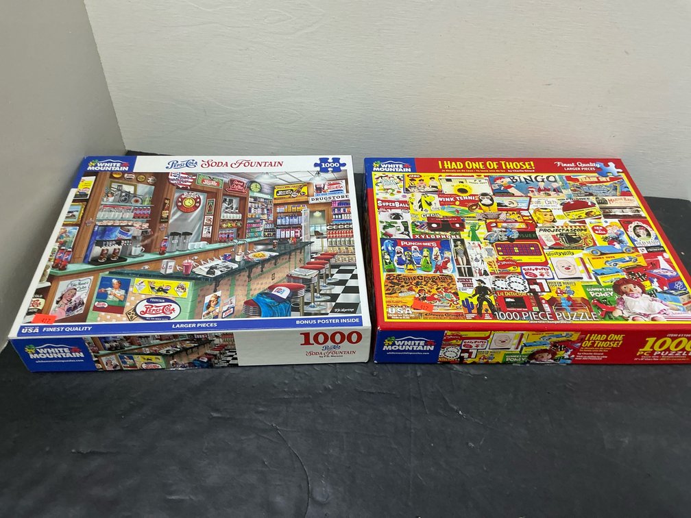 2 White Mountain 1000-piece jigsaw puzzles