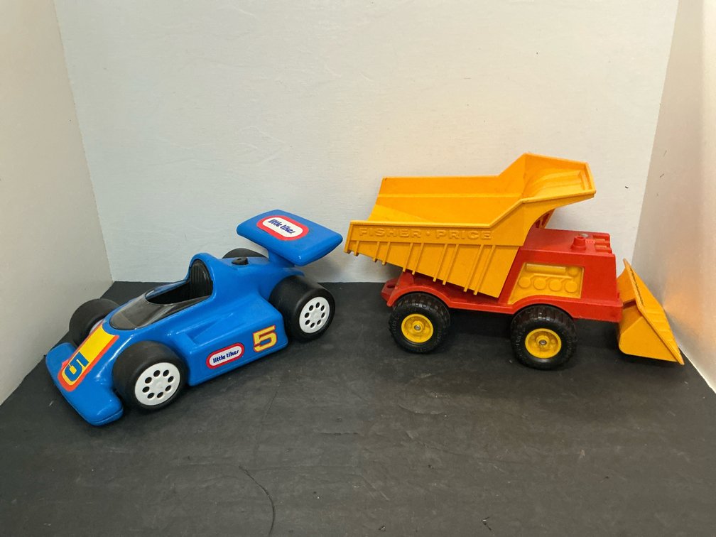 Pair of plastic toy vehicles with race car & dump truck