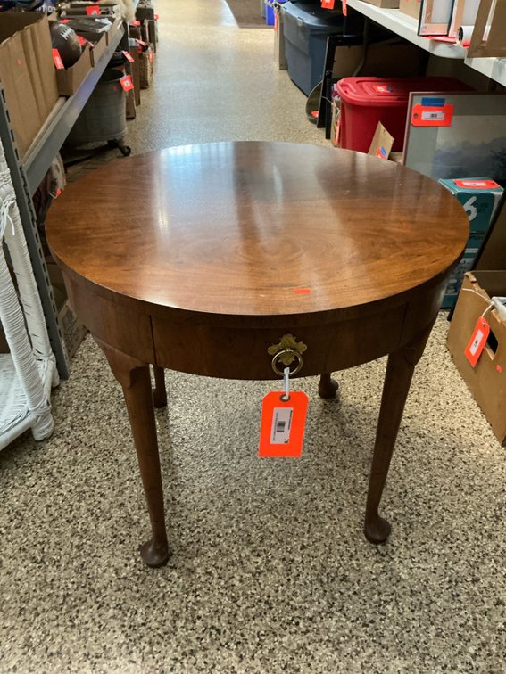 Milling Road round wood side table with drawer 26” x 24”