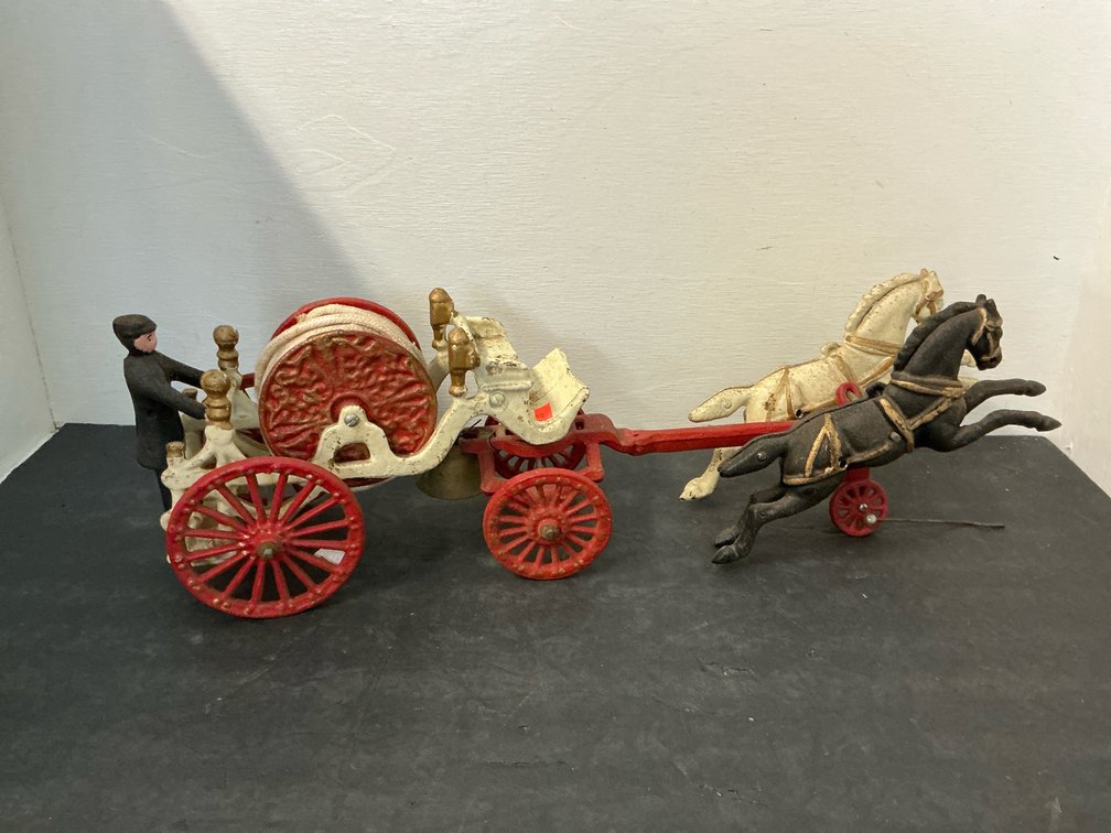Cast iron horse-drawn fire hose wagon with 2 horses & driver