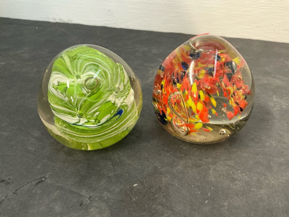 Pair of art glass swirl & speckled paperweights
