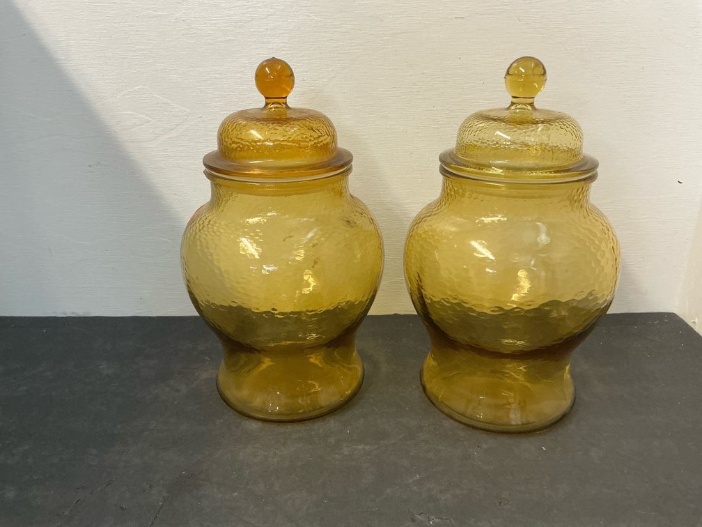 Pair of amber hammered glass canister jars with lids