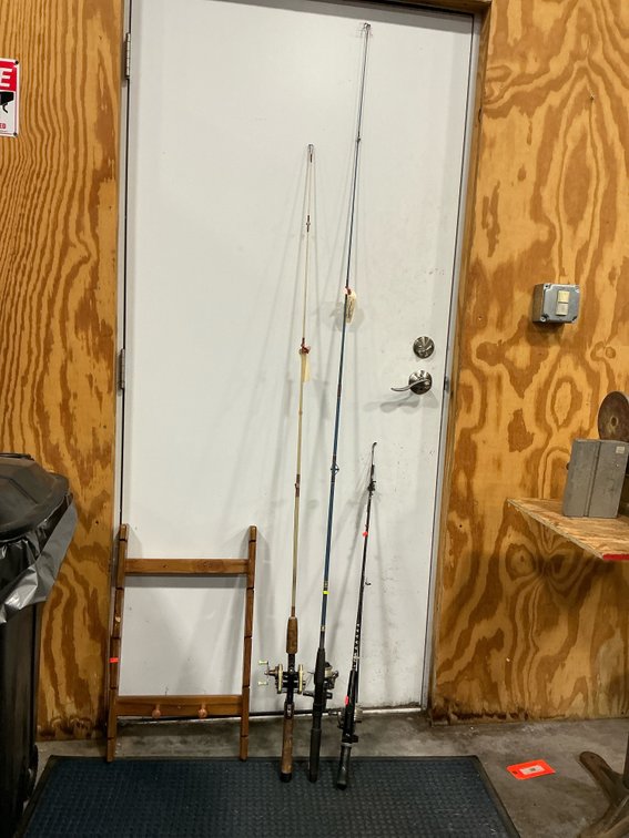 Fishing rods with reels & wooden wall rack