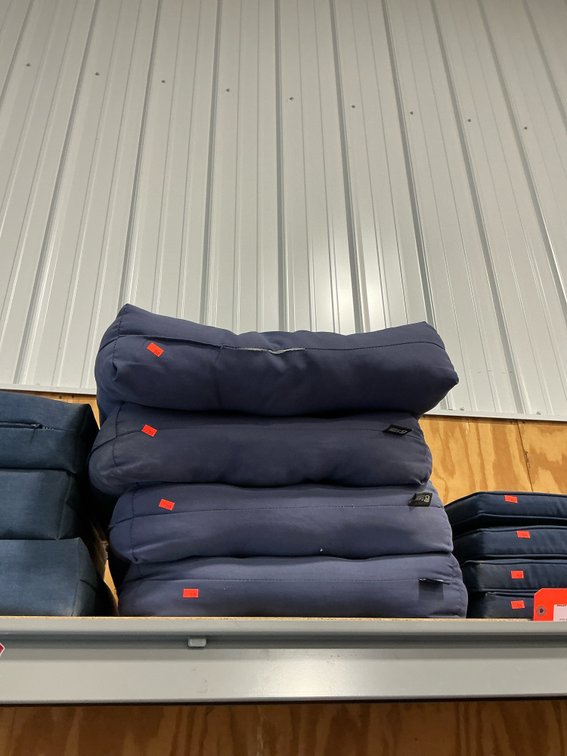 Grouping of Classic Accessories blue outdoor cushions