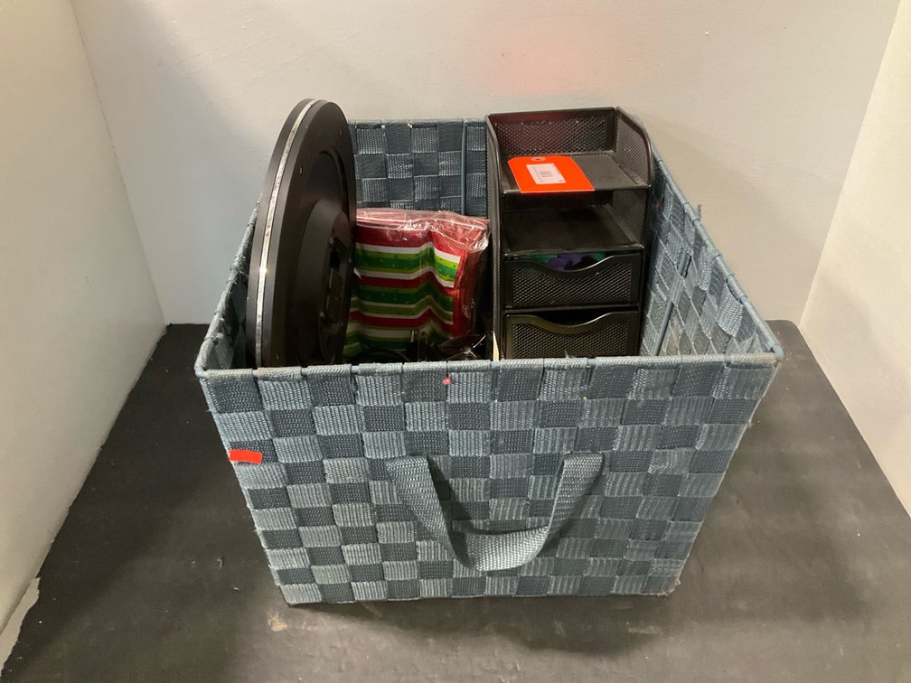 Blue woven storage bin with wall clock, work gloves & more